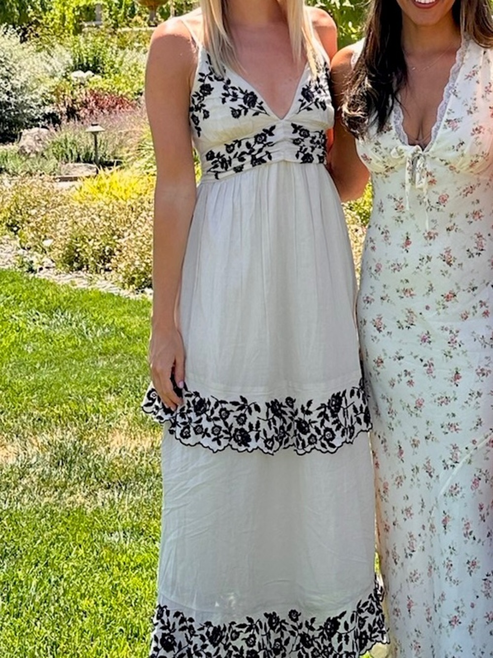 Ivory dress with black embroidered print. Tie straps/back. Like new!